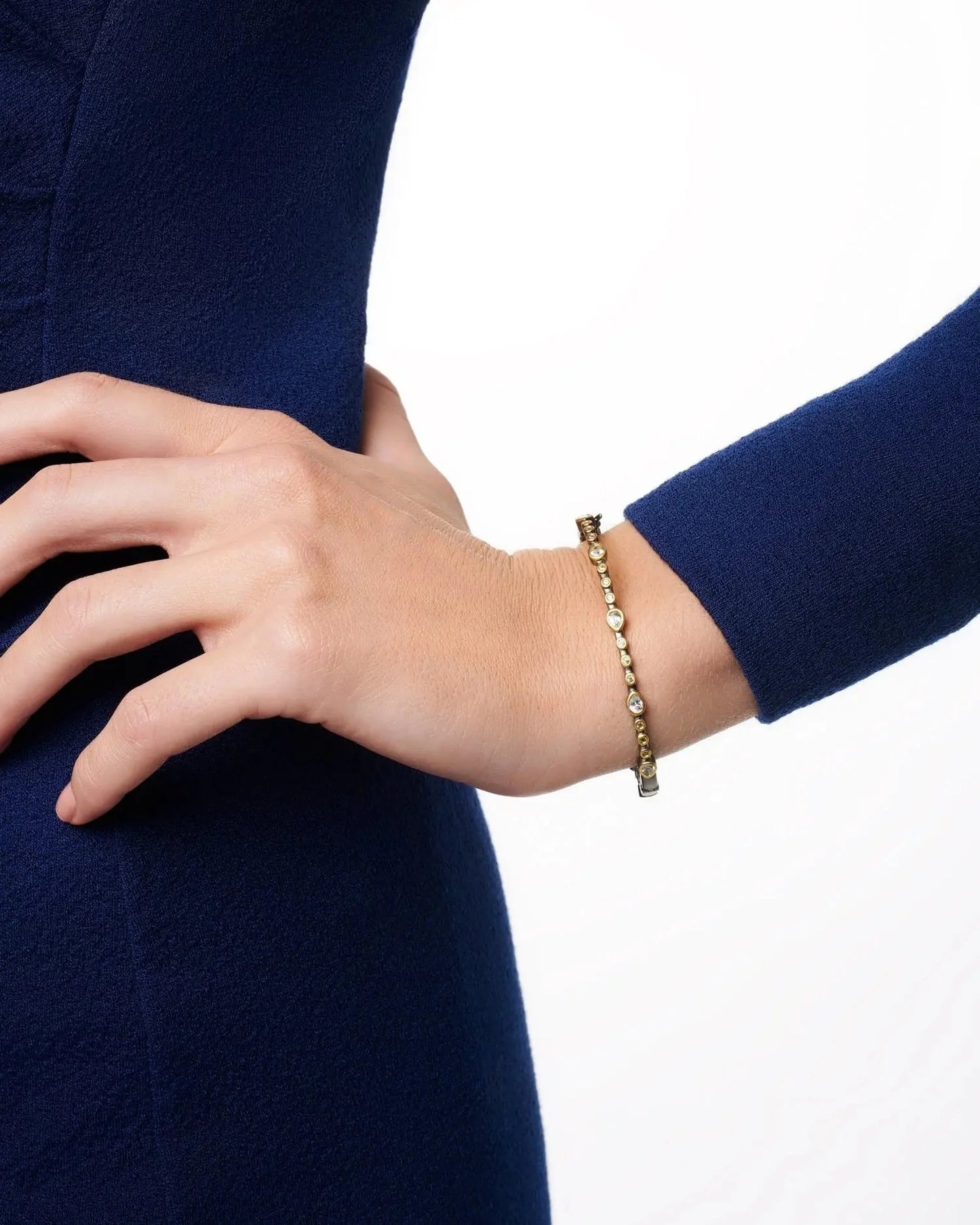 TEARDROP STATION HINGE BANGLE SILVER AND BLACK